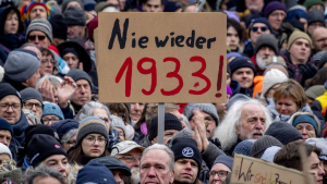 People gather to protest the far-right Alternative for Germany, or AfD party, and right-wing extremism in Frankfurt, Germany, Jan. 20, 2024. (AP Photo/Michael Probst, File)