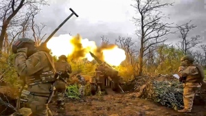 In this image taken from video released by the Russian Defense Ministry Press Service on Aug. 8, 2023, a Russian howitzer fires toward Ukrainian positions at an undisclosed location. Russian President Vladimir Putin has cast the conflict in Ukraine as a life-or-death battle against the West, with Moscow ready to protect its gains at any cost. (Russian Defense Ministry Press Service via AP, File)