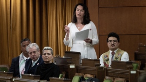NDP MP for Edmonton Strathcona Heather McPherson rises to introduce a motion on the situation in the Middle East, Monday, March 18, 2024 in Ottawa. THE CANADIAN PRESS/Adrian Wyld