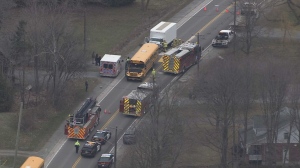 A truck driver was seriously injured in a collision involving a school bus in Whitby.