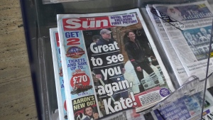 Newspapers on display for sale, in London, Tuesday, March 19, 2024. A British newspaper says Prince William and his wife Catherine have been filmed at a farm shop near their Windsor home. It's the first reported footage of Kate since she had abdominal surgery for an unspecified condition two months ago. (AP Photo/Kirsty Wigglesworth)