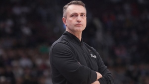 Toronto Raptors head coach Darko Rajakovic reacts during his team's loss to San Antonio Spurs NBA basketball action in Toronto on Monday, Feb. 12, 2024. Rajakovic remembers what it's like to be an eager young basketball coach, trying to absorb as much as possible from more experienced teachers. THE CANADIAN PRESS/Chris Young