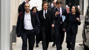 Attorney David Sherborne, second from left, at the Rolls Buildings, central London, Wednesday March 20, 2024. Britain's Prince Harry's lawyer says the cover-up of unlawful information gathering at British tabloids owned by Rupert Murdoch went all the way to the top. (Jordan Pettitt/PA via AP)