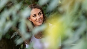 FILE - Britain's Kate, the Duchess of Cambridge reacts during a visit to Battersea Park, as she met up with mothers, in London, Tuesday, Sept. 22, 2020. (Jack Hill/Pool Photo via AP, File)