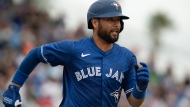 Toronto Blue Jays infielder Isiah Kiner-Falefa runs out a ground ball during Spring Training action against the Boston Red Sox Friday, March 22, 2024, in Dunedin, Fla. THE CANADIAN PRESS/Mark Taylor