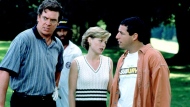 (From left) Christopher McDonald, Julie Bowen, Adam Sandler in 'Happy Gilmore.'  It sounds like Adam Sandler might be teeing up a sequel to his famed 1996 golf comedy “Happy Gilmore,” at least according to actor Christopher McDonald. (Universal/Courtesy Everett Collection via CNN Newsource)