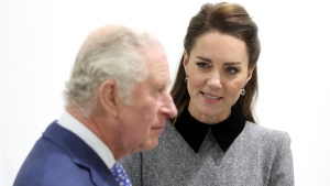 FILE - Britain's Prince Charles and Kate, Duchess of Cambridge during their visit to The Prince's Foundation training site for arts and culture at Trinity Buoy Wharf in London, England, Thursday, Feb. 3, 2022. (Chris Jackson/Pool Photo via AP, File)