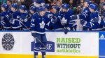 Toronto Maple Leafs' Bobby McMann (74) celebrates a goal against the Edmonton Oilers during first period NHL hockey in Toronto, Saturday, March 23, 2024. THE CANADIAN PRESS/Nick Iwanyshyn 
