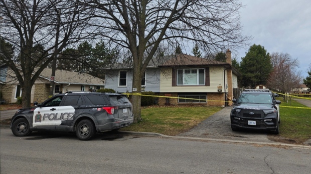 Police tape surrounds a house on Elma Sreet in St. Catherines after two people were found deceased inside. (Matthew Holmes/610 CKTB)