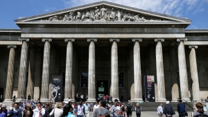Visitors walk outside the British Museum in Bloomsbury, London, Friday, June 26, 2015. (AP Photo/Tim Ireland, File)