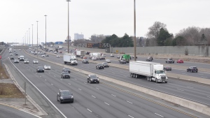 Traffic uses 401 Highway in Toronto on Wednesday, January 3, 2024. THE CANADIAN PRESS/Chris Young 