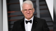 FILE - Steve Martin arrives at the 2015 Vanity Fair Oscar Party on Sunday, Feb. 22, 2015, in Beverly Hills, Calif. Martin is the subject of a new documentary "Steve! (Martin) a Documentary in 2 Pieces." (Photo by Evan Agostini/Invision/AP, File)