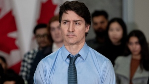 Prime Minister Justin Trudeau listens to a speaker during a housing announcement in Vancouver, Wednesday, March 27, 2024. THE CANADIAN PRESS/Ethan Cairns 