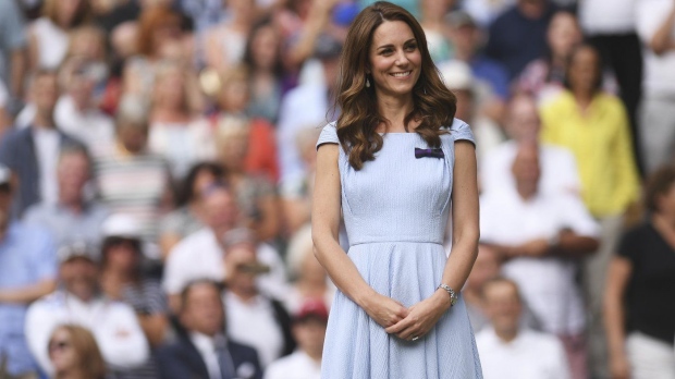 Britain's Kate, Duchess of Cambridge stands on centre court during the trophy presentation after Serbia's Novak Djokovic defeated Switzerland's Roger Federer during the men's singles final match of the Wimbledon Tennis Championships in London, Sunday, July 14, 2019. (Laurence Griffiths/Pool Photo via AP, File)