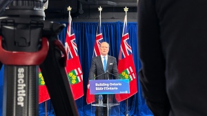 Ontario Finance Minister Peter Bethlenfalvy speaks in the government's new communication centre in the basement of a building connected to the Ontario legislature by tunnel on Tuesday March 26, 2024. The Ontario government is spending about $310,000 on a new space for press conferences, which opposition parties say duplicates a room that already exists and will mean less access for the media. THE CANADIAN PRERSS/Liam Casey

