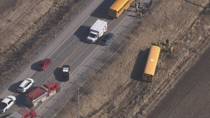 A school bus is in a ditch following a crash on Highway 12 in Brock, Ont. on Thursday, March 28, 2024. (Chopper 24)