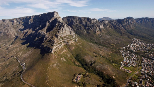 In this Monday, Oct. 19, 2009 file photo, an aerial view of Table mountain, left, that form's the back drop of Cape Town city, in Cape Town, South Africa. (AP Photo / Schalk van Zuydam, File)