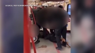 A screengrab of a video that shows a March 26 arrest on a TTC train at Eglinton West Station. (DwayneConnellClothing/Instagram)