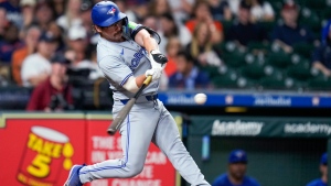 Toronto Blue Jays' Davis Schneider hits a two-run home run against the Houston Astros during the ninth inning of a baseball game Tuesday, April 2, 2024, in Houston. (AP Photo/Eric Christian Smith)