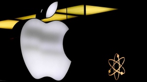 The Apple logo is illuminated at a store in Munich, Germany, Nov. 13, 2023.(AP Photo/Matthias Schrader, File)