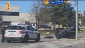 Police on scene of a two-vehicle collision in the Argentia and Derry roads area that sent three to hospital on April 6, 2024. (David Ritchie / CP24)