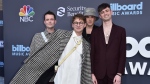 Drew MacFarlane, from left, Dave Bayley, Joe Seaward and Edmund Irwin-Singer of Glass Animals arrive at the Billboard Music Awards on Sunday, May 15, 2022, at the MGM Grand Garden Arena in Las Vegas. The English indie-pop band releases its fourth album on July 19. (Jordan Strauss / AP)
