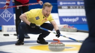 Sweden skip Niklas Edin in action during the final game against Canada at the Men's World Curling Championship, at the IWC Arena in Schaffhausen, Switzerland, Sunday, April 7, 2024. (Christian Beutler / The Canadian Press) 