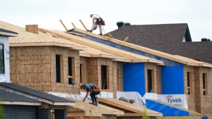 New homes are constructed in Ottawa on Monday, Aug. 14, 2023. The Bank of Canada's next rate announcement is unlikely to spur much immediate movement in the national housing market, but economists say it may be just a matter of months until buyers come crawling back from the sidelines. THE CANADIAN PRESS/Sean Kilpatrick
