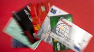 Insolvency firm MNP Ltd. says some Canadians are feeling a little more optimistic about their debt with the prospect of interest rate cuts on the horizon. Credit cards are shown on Thursday, Oct. 6, 2022. THE CANADIAN PRESS/Andrew Vaughan
