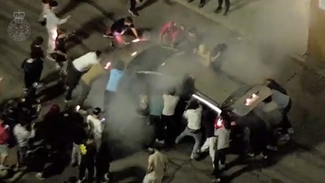 Participants shake a vehicle at a car rally in video released by York Regional Police. (YRP /Handout) 