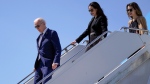 U.S. President Joe Biden arrives on Air Force One Monday, March 13, 2023, at North Island Naval Air Station in San Diego, with his daughter Ashley, centre, and granddaughter Natalie. (AP Photo / Evan Vucci)