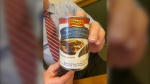 Ontario Liberal Parliamentary Leader John Fraser passed the premier a can of gravy as a reminder of his family's political slogan. (Provided by Ontario Liberal Party)
