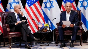 President Joe Biden and Israeli Prime Minister Benjamin Netanyahu participate in an expanded bilateral meeting with Israeli and U.S. government officials, Wednesday, Oct. 18, 2023, in Tel Aviv. (AP Photo/Evan Vucci) 