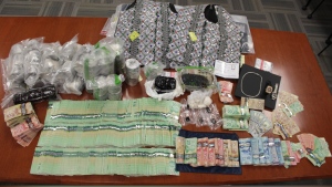 Photo shows the items seized by police during searches in the Greater Toronto Area on March 1, 2024. (Peel Regional Police)
