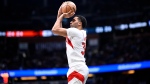 Toronto Raptors center Jontay Porter attempts a 3-point shot during the second half of an NBA basketball game against the Orlando Magic, Sunday, March 17, 2024, in Orlando, Fla. (AP Photo/Phelan M. Ebenhack) 
