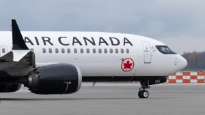 An Air Canada jet taxis at the airport, Wednesday, November 15, 2023 in Vancouver. THE CANADIAN PRESS/Adrian Wyld