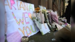 FILE - Flower tributes are seen at St Ann's Square, Manchester, England, May 23, 2017, after a suicide bombing attack at an Ariana Grande concert at the Manchester Arena. More than 250 survivors of the suicide bombing that killed 22 people at a 2017 Ariana Grande concert in Manchester, England, are taking legal action against Britain's domestic intelligence agency, lawyers said Sunday, April 14, 2024. (AP Photo/Rui Vieira, File)