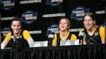 Iowa guard Caitlin Clark, left, guard Gabbie Marshall, center and guard Kate Martin speak to reporters during a news conference at the women's college basketball NCAA Tournament in Albany, N.Y., Friday, March 29, 2024. (AP Photo/Mary Altaffer)