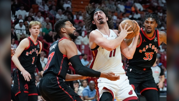 Miami Heat guard Jaime Jaquez Jr. (11) reacts after being fouled by Toronto Raptors forward Garrett Temple (17) during the first half of an NBA basketball game, Sunday, April 14, 2024, in Miami. (AP Photo/Rebecca Blackwell)