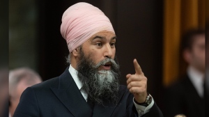 Federal NDP Leader Jagmeet Singh insists his party's position on carbon pricing remains unchanged, although he won't say whether he supports making Canadians pay it on consumer items like gasoline. Singh rises during question period in Ottawa, Monday, April 15, 2024. THE CANADIAN PRESS/Adrian Wyld