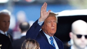 Former President Donald Trump, leaves Trump Tower for Manhattan Criminal Court in New York on Tuesday, April 16, 2024. (AP Photo/Noah K. Murray)