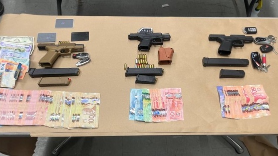 A variety of contraband seized by Toronto police as part of a carjacking investigation is shown. (Toronto Police Service)