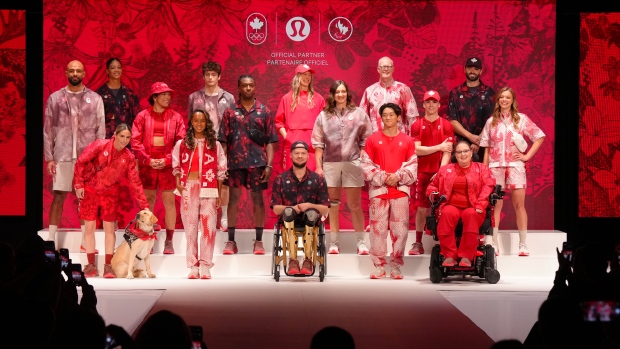 Athletes show the collection during the unveiling of the Team Canada Lululemon Athlete Kit for the Paris 2024 Olympic and Paralympic Games in Toronto on Tuesday, April 16, 2024.THE CANADIAN PRESS/Chris Young 
