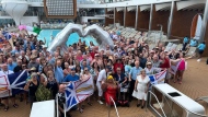 About 500 Newfoundlanders were inadvertently booked on the same 3,000-person Caribbean cruise this month. Pictured in this handout photo taken April 12, 2024, near Cuba, they had a Newfoundland party on the main pool deck. THE CANADIAN PRESS/HO