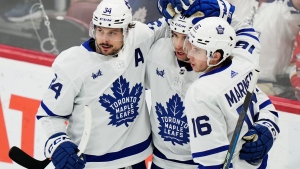 Toronto Maple Leafs' Mitch Marner (16) celebrates his goal against the Florida Panthers with Auston Matthews (34) and John Tavares (91) during first period NHL hockey action in Sunrise, Fla. on Tuesday, April 16, 2024. THE CANADIAN PRESS/Frank Gunn