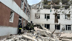 In this photo provided by the Ukrainian Emergency Service, rescuers work at the site of a Russian missile strike in Chernihiv, Ukraine, Wednesday, April 17, 2024. (Ukrainian Emergency Service via AP Photo) 
