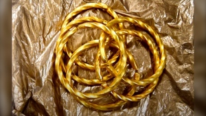 Gold bracelets recovered as part of an investigation into a gold heist at Toronto Pearson airport are displayed in this image from Peel police. (Handout) 