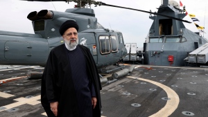 In this photo released by the Iranian Presidency Office, President Ebrahim Raisi visits an exhibition of the Revolutionary Guard navy capabilities in the southern port city of Bandar Abbas, Iran, Friday, Feb. 2, 2024. (Iranian Presidency Office via AP)