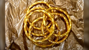 Six gold bracelets that resemble bangles were uncovered, however upon further examination, investigators discovered they contain pure gold, valued at over $89,000, and lacking resemblance to traditional fine jewellery.