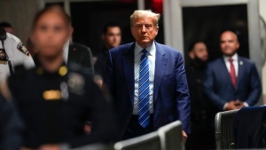 Former President Donald Trump approaches to speak to reporters as he leaves a Manhattan courtroom after the second day of his criminal trial, Tuesday, April 16, 2024 in New York. (AP Photo/Mary Altaffer, Pool)